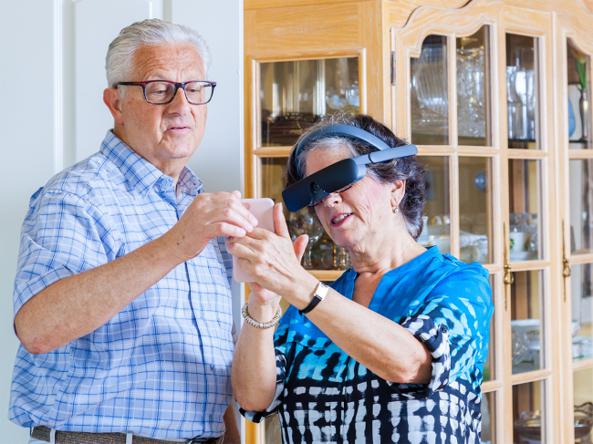 Woman wearing Esight 4 at home