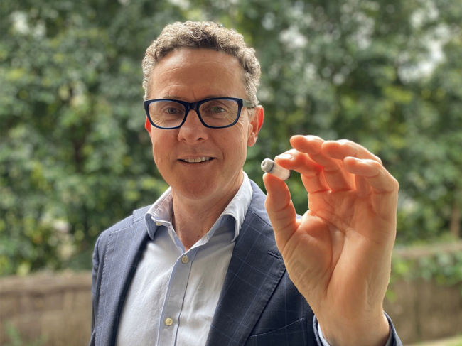 Atmo CEO holding capsule