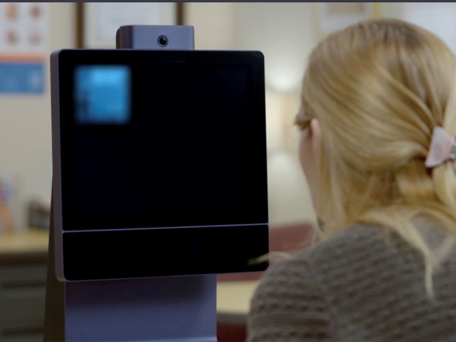 Woman using Eyebox device