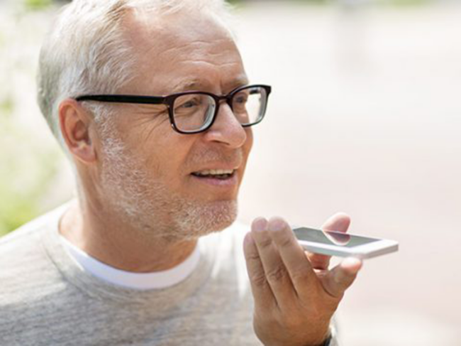 Man talking into smartphone