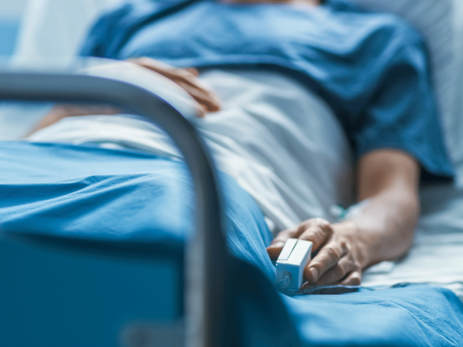 Patient in hospital bed