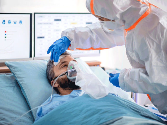 Ventilated patient in quarantine receiving care