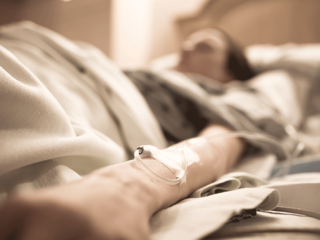 Patient in hospital bed