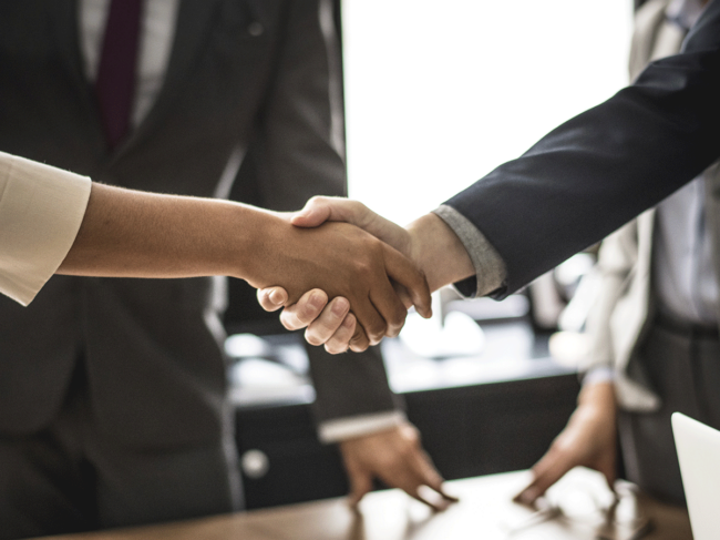 Handshake in office setting