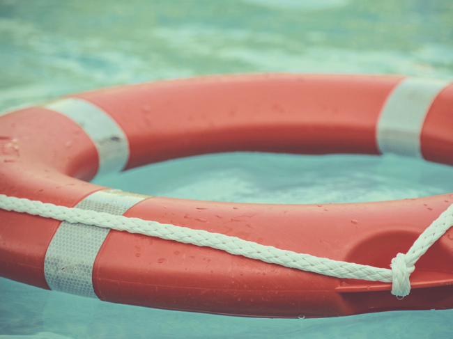 Life ring buoy floating in water