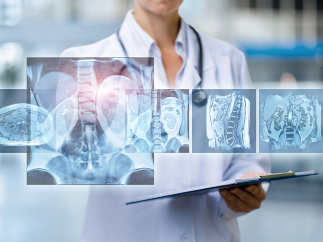 Health professional reviewing orthopedic imaging
