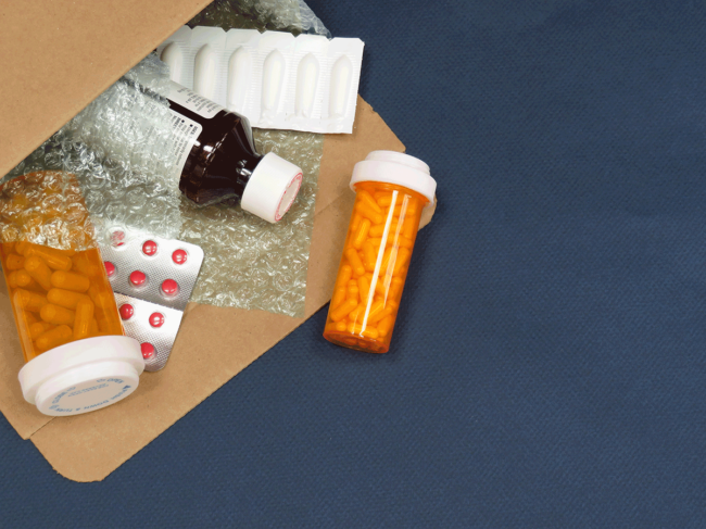 Pill bottles, blister packs in a package