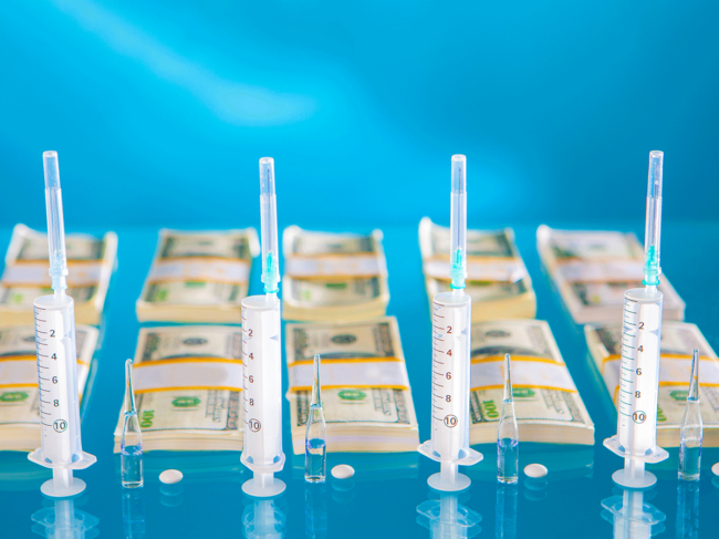 Syringes, ampoules, pills and money