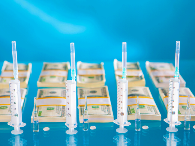 Syringes, ampoules, pills and money