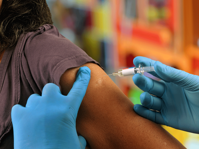 Person receiving vaccine