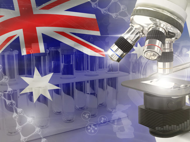 Australia flag with microscope, test tubes