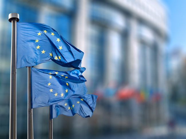 EU flags in front of the Berlaymont building