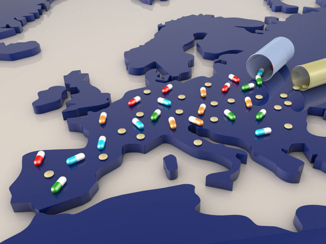 Medicine spilling onto map of Europe