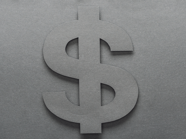 Grey dollar sign on grey background