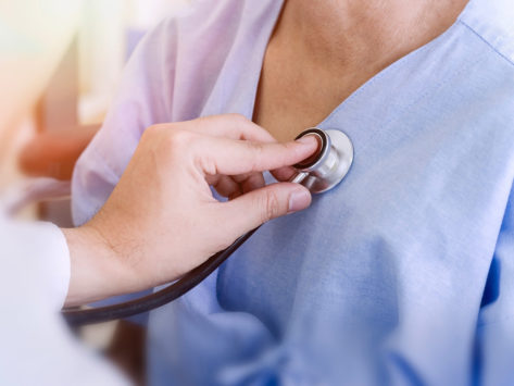 Doctor, female patient, stethoscope