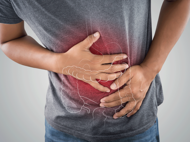 Outline of intestine and person holding stomach in painntestine on person holding stomach in pain