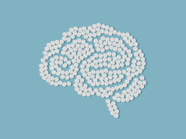 Brain illustrated with pills