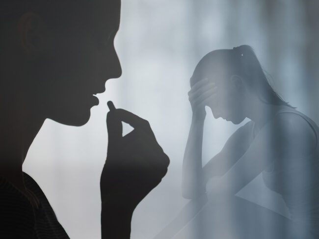 Woman taking medication for mental illness